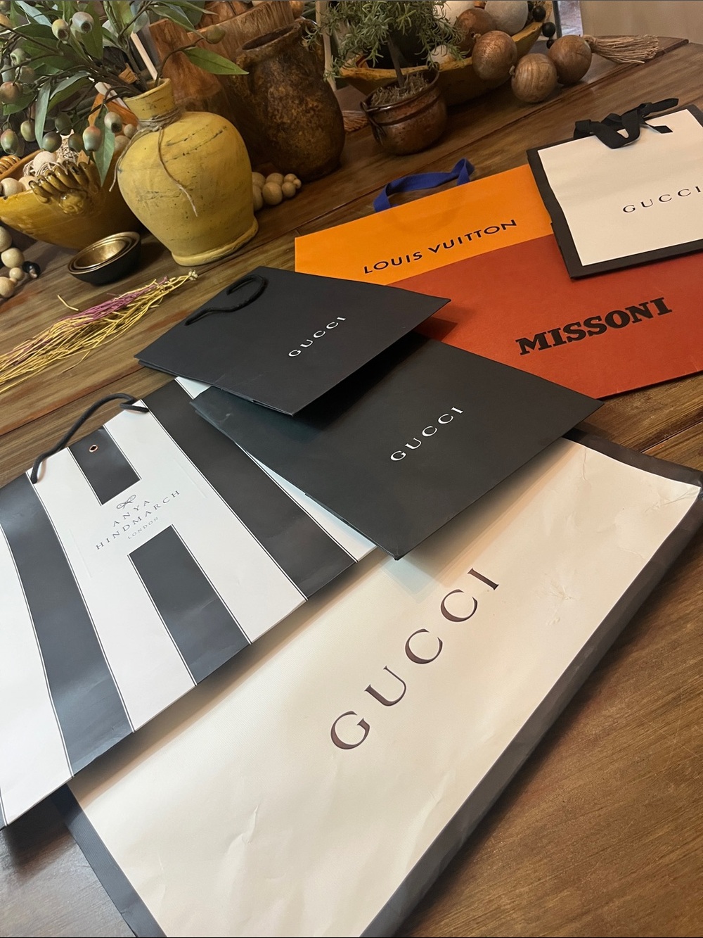 7 designer shopping bags.. Gucci, LV